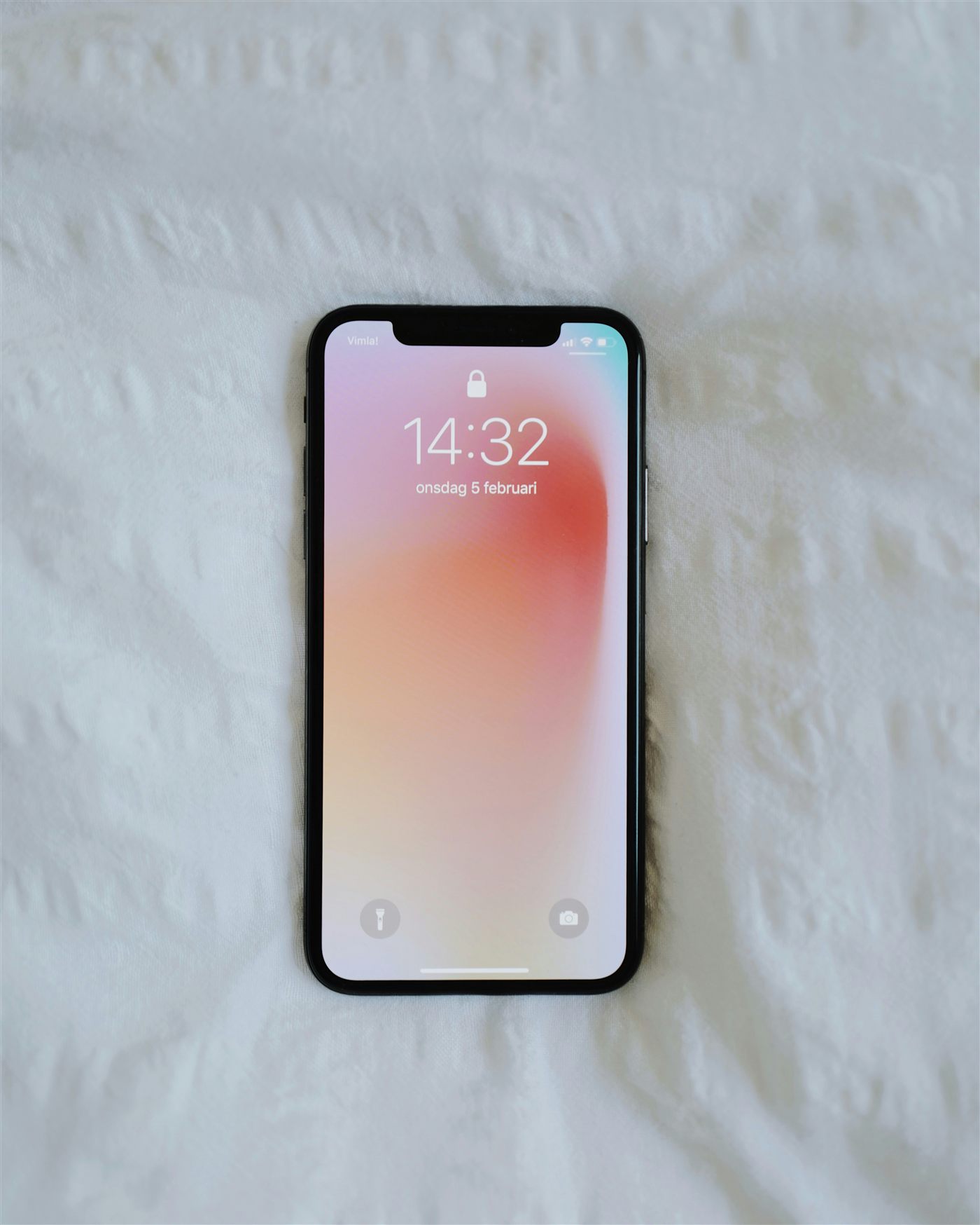 Phone with a clean, bubble-free tempered glass screen protector